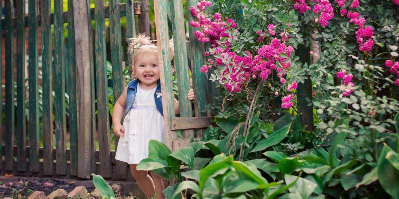 little-girl-exploring-in-back-yard.jpg